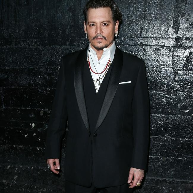 Johnny Depp's twist on classic black suit